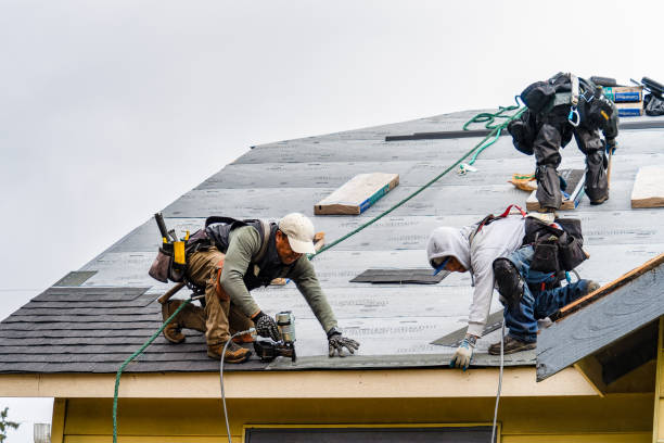 Professional Gutter Installation technician working in Passaic, NJ